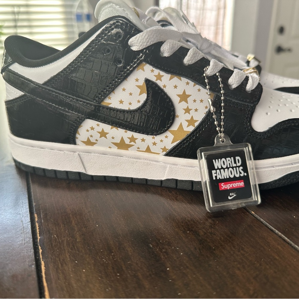 Nike Black and White Athletic Shoes with Gold Accents